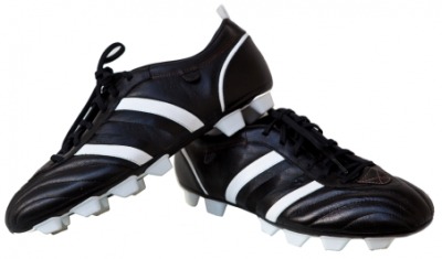 A pair of shoes with cleats. A pair of shoes with cleats.