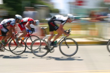 Cyclist competing in a race. Cyclist competing in a race.