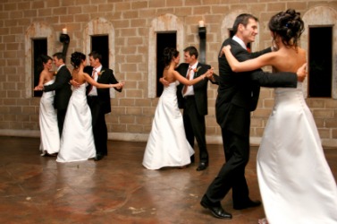 Couples dancing at a wedding. Couples dancing at a wedding.