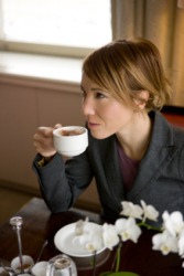 A businesswoman taking a coffee break. A businesswoman taking a coffee break.