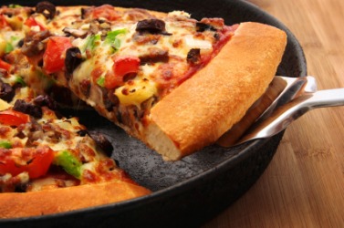 A deep-dish pizza. A deep-dish pizza.