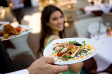 A young woman about to dine. A young woman about to dine.