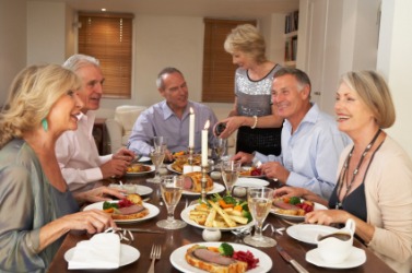 A group of friends having dinner together. A group of friends having dinner together.