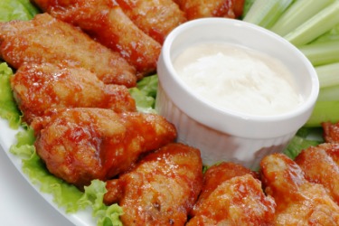 A plate of drumettes. A plate of drumettes.
