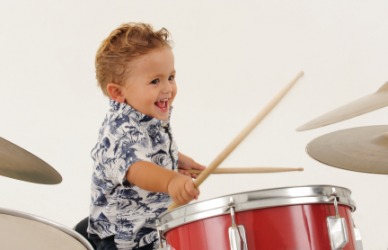 A very young drummer. A very young drummer.