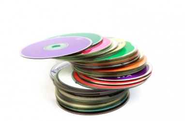 A stack of colorful DVD's. A stack of colorful DVD's.