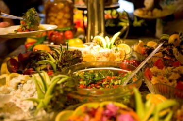 A table covered with very edible foods. A table covered with very edible foods.