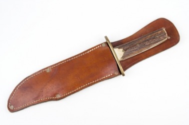 A knife ensheathed. A knife ensheathed.