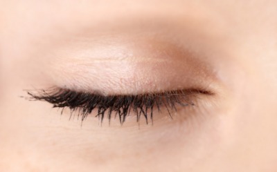 A closed eyelid. A closed eyelid.