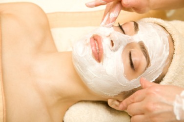 A woman receiving a facial. A woman receiving a facial.