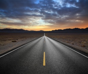 The edges of this road appear to converge in the distance. The edges of this road appear to converge in the distance.