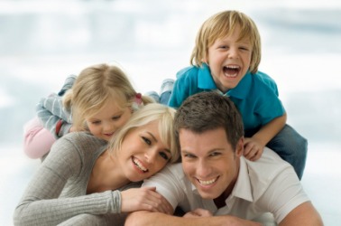 A happy family man with his family. A happy family man with his family.
