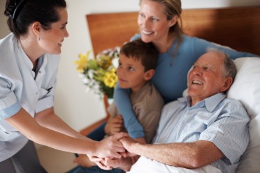 A family practitioner seeing a patient. A family practitioner seeing a patient.