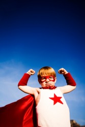 A child fantasizes about being a superhero. A child fantasizes about being a superhero.