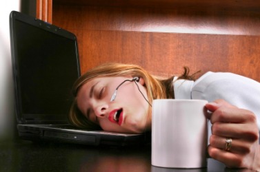 A woman suffering from fatigue. A woman suffering from fatigue.