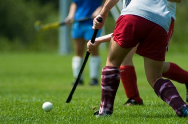 A game of field hockey. A game of field hockey.
