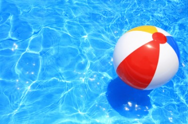 This beach ball floats on the water. This beach ball floats on the water.