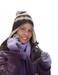 A woman wearing winter attire. A woman wearing winter attire.
