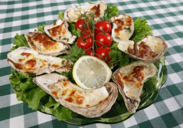 A dish of oyster au gratin. A dish of oyster au gratin.