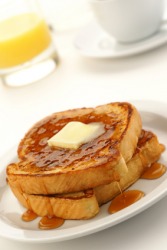 A plate of French toast. A plate of French toast.