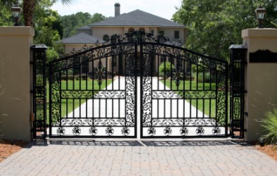 A wrought iron gate. A wrought iron gate.