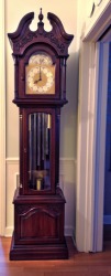 A grandfather clock. A grandfather clock.