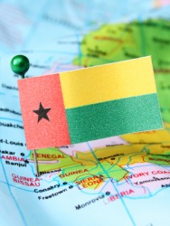 The flag of Guinea-Bissau marks its location on a map. The flag of Guinea-Bissau marks its location on a map.