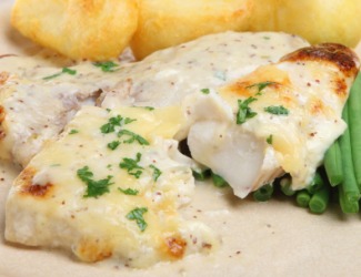 A plate of grilled haddock. A plate of grilled haddock.