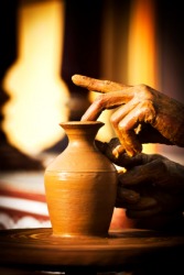 A person creates a handmade pot. A person creates a handmade pot.
