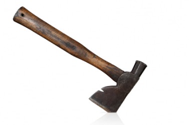 A wooden handled hatchet. A wooden handled hatchet.