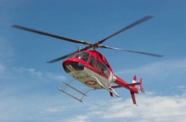 A helicopter in flight. A helicopter in flight.