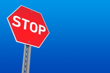 This stop sign is a hexagon. This stop sign is a hexagon.