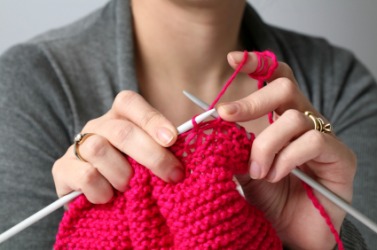 This womans' hobby is knitting. This womans' hobby is knitting.