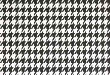 A piece of houndstooth check fabric. A piece of houndstooth check fabric.