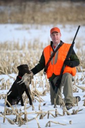 A hunter and his dog. A hunter and his dog.