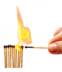 A person uses one match to ignite the others. A person uses one match to ignite the others.