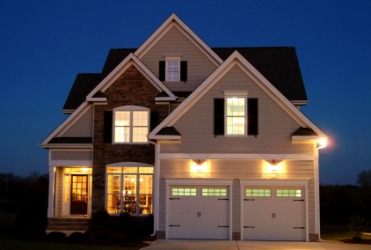A house illuminated at night. A house illuminated at night.