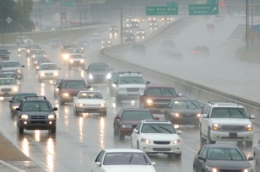 Rush hour traffic in inclement weather. Rush hour traffic in inclement weather.