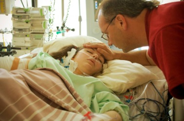 A patient receives intensive care. A patient receives intensive care.
