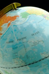 The international date line runs through the Pacific Ocean. The international date line runs through the Pacific Ocean.