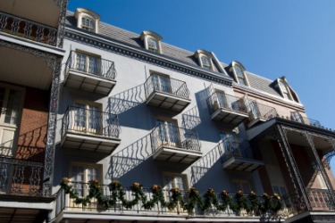 Several balconies with iron railings. Several balconies with iron railings.