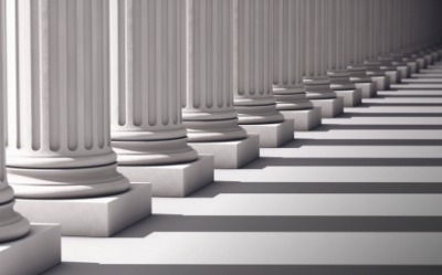 The shadows of the columns come in intervals. The shadows of the columns come in intervals.