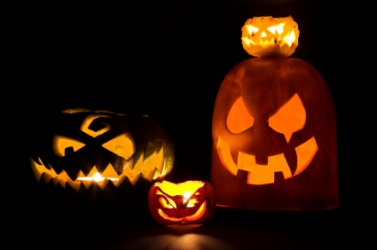 A group of jack-o'-lanterns. A group of jack-o'-lanterns.