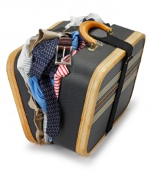 A jampacked suitcase. A jampacked suitcase.