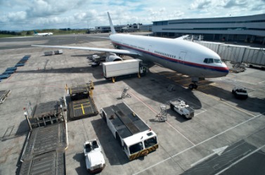 A jetliner at the airport terminal. A jetliner at the airport terminal.