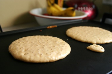 Johnnycakes on the griddle. Johnnycakes on the griddle.