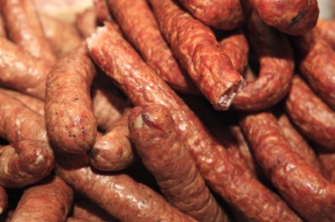 A pile of different types of kielbasa. A pile of different types of kielbasa.