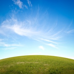 A grass covered knoll. A grass covered knoll.