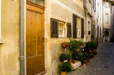 A street with old houses in Aix-En-Provence. A street with old houses in Aix-En-Provence.