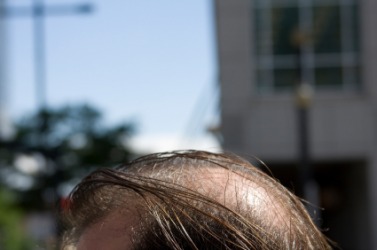A man with a comb over. A man with a comb over.